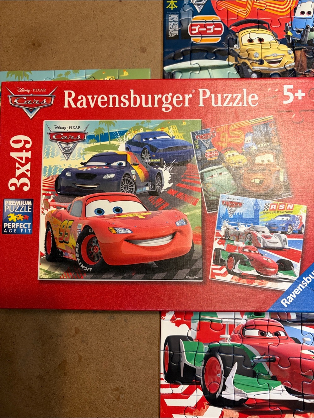 🧩 Ravensburger Disney Pixar Cars 3-Pack Set “Worldwide Racing Fun”. Complete.